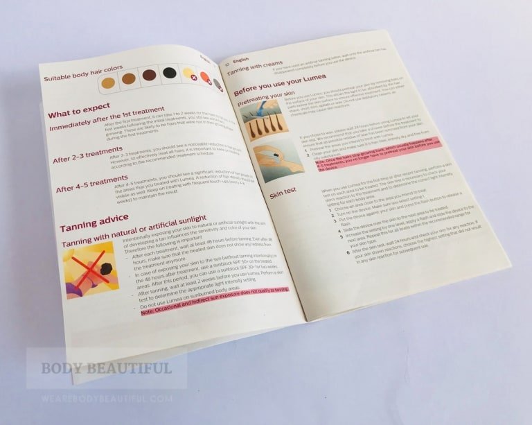 Phto of the Lumea Advanced user manual open at the skin tone suitability and tanning guidelines page
