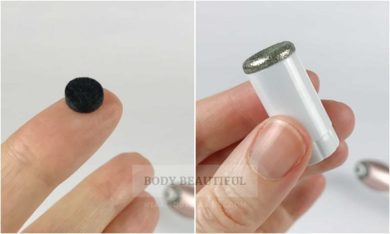 Photo of the small round black wool filter and the standard diamond tip
