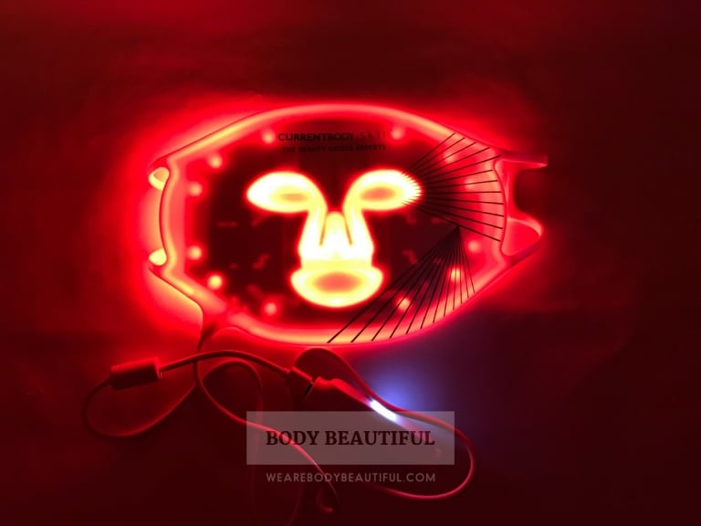 The bright red LEDs shining through the eye, nose and mouth holes on the CurrentBody.com Skin LED light therapy mask