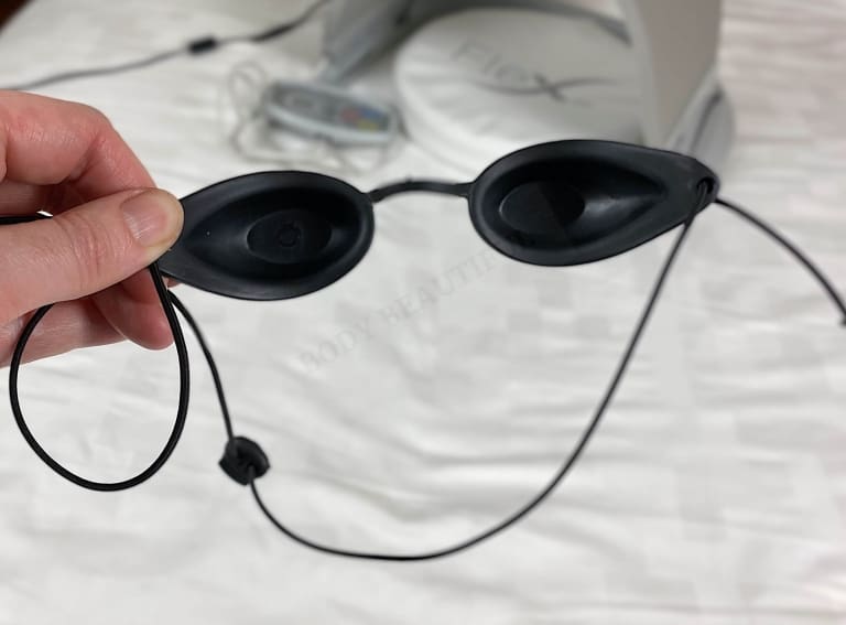 The small opaque, black protective goggles you get with the Flex MD LEd device